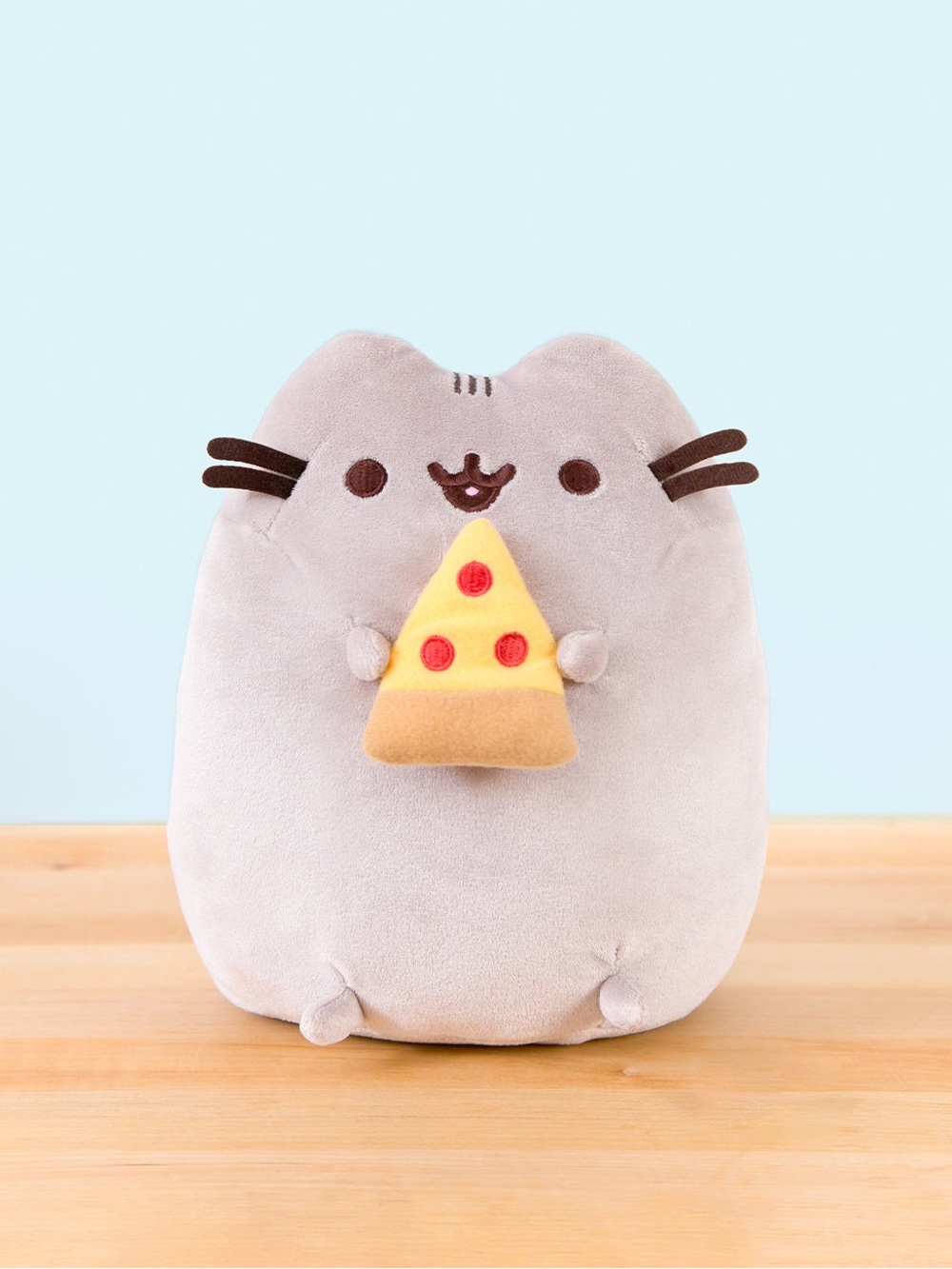 Pusheen Plush Toy in Light Gray Holding Yellow Pizza Slice